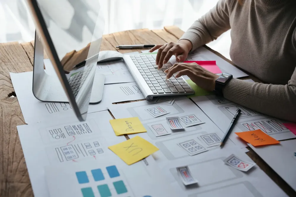 Designer carefully crafting a landing page