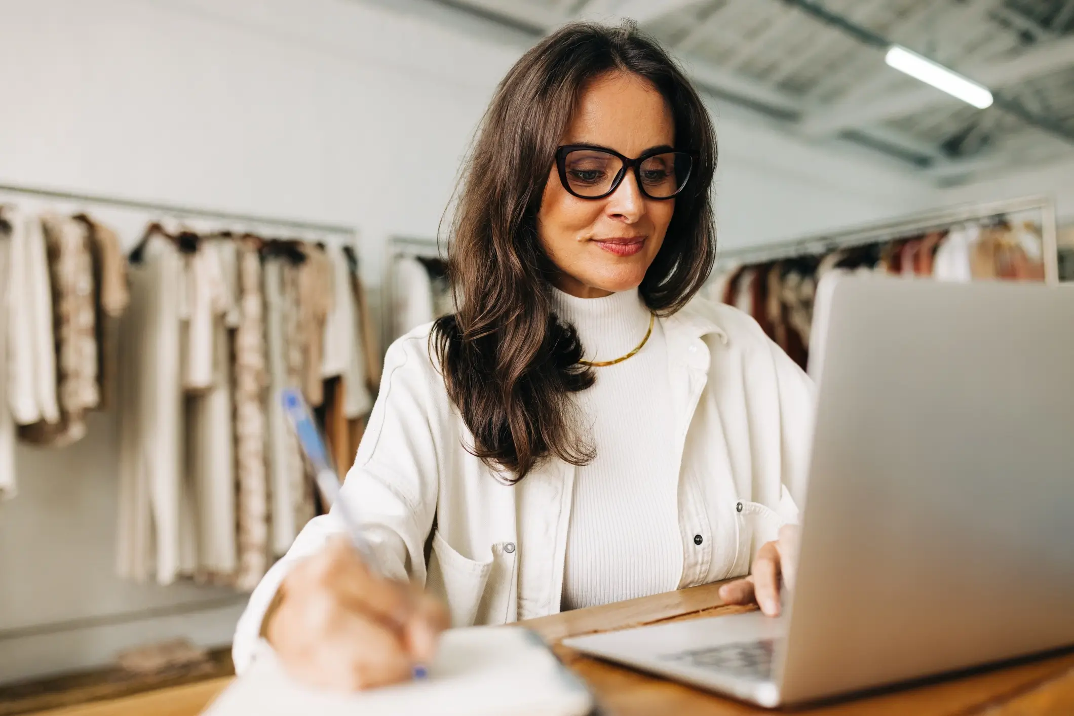 Small business owner taking notes
