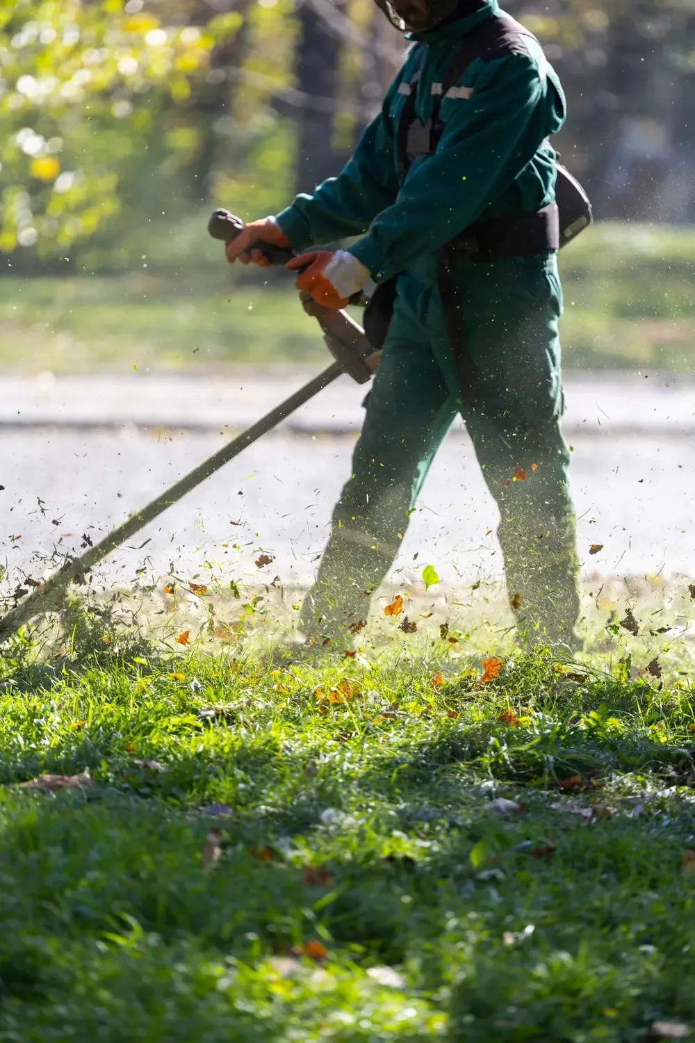 A landscaper working on a residential yard