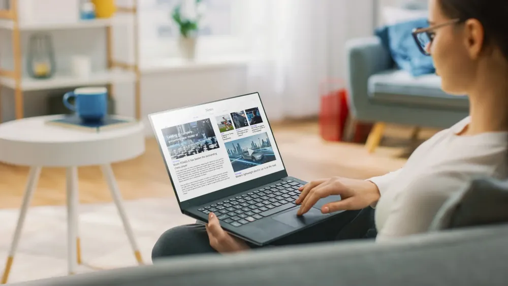 business owner viewing a website on their laptop