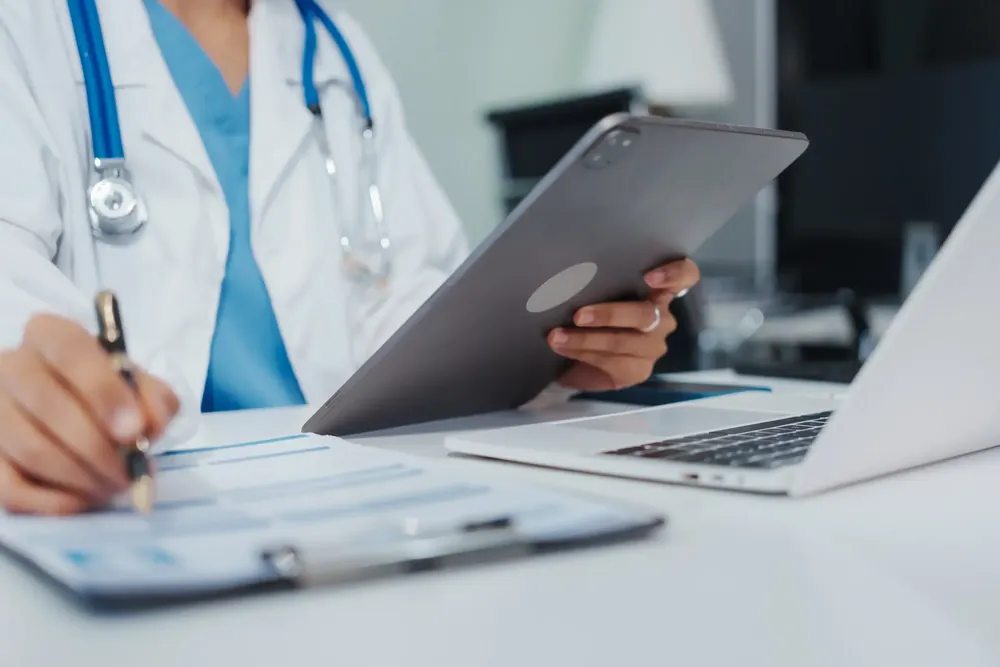 doctor working on a computer
