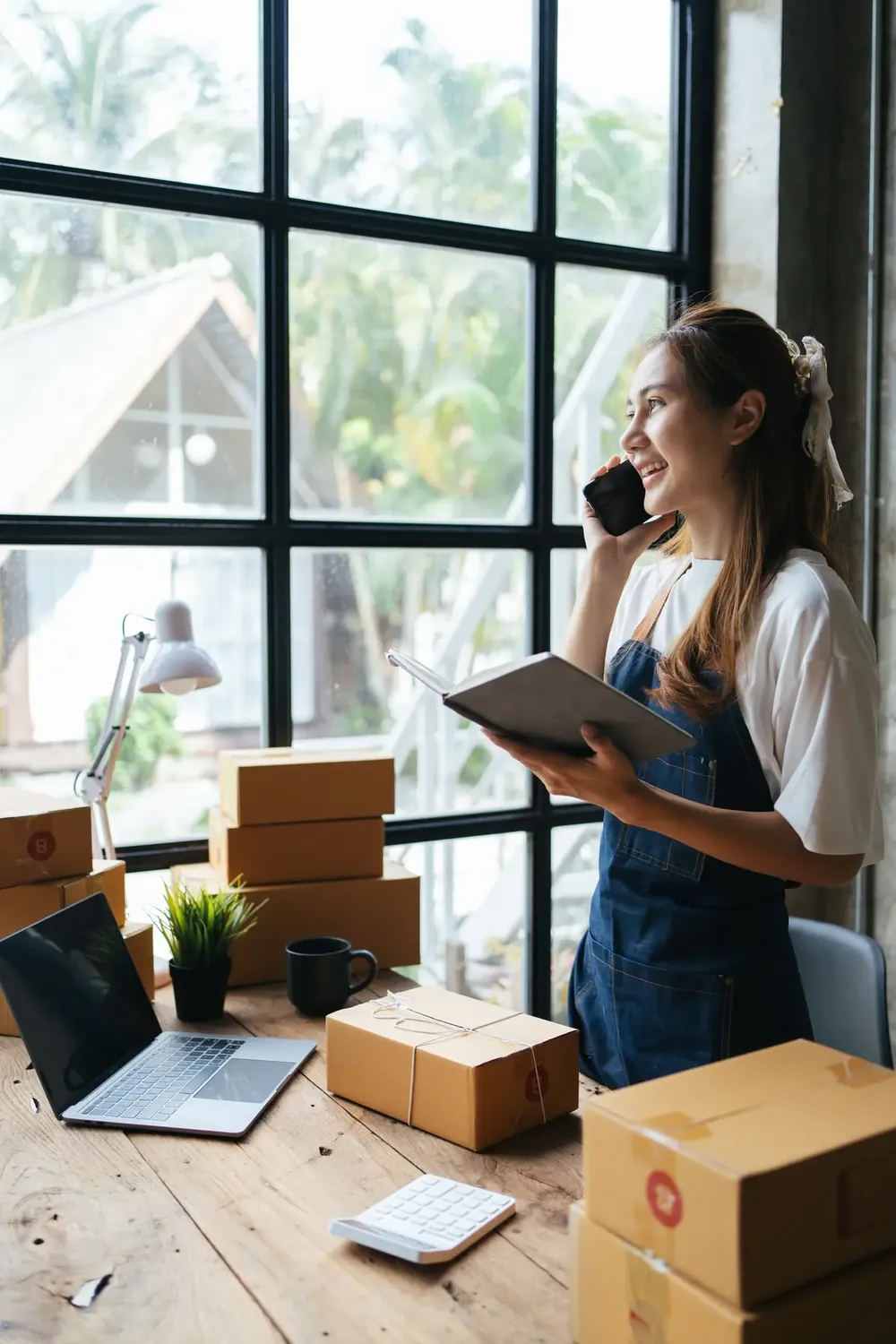 Woman business owner making a phone call